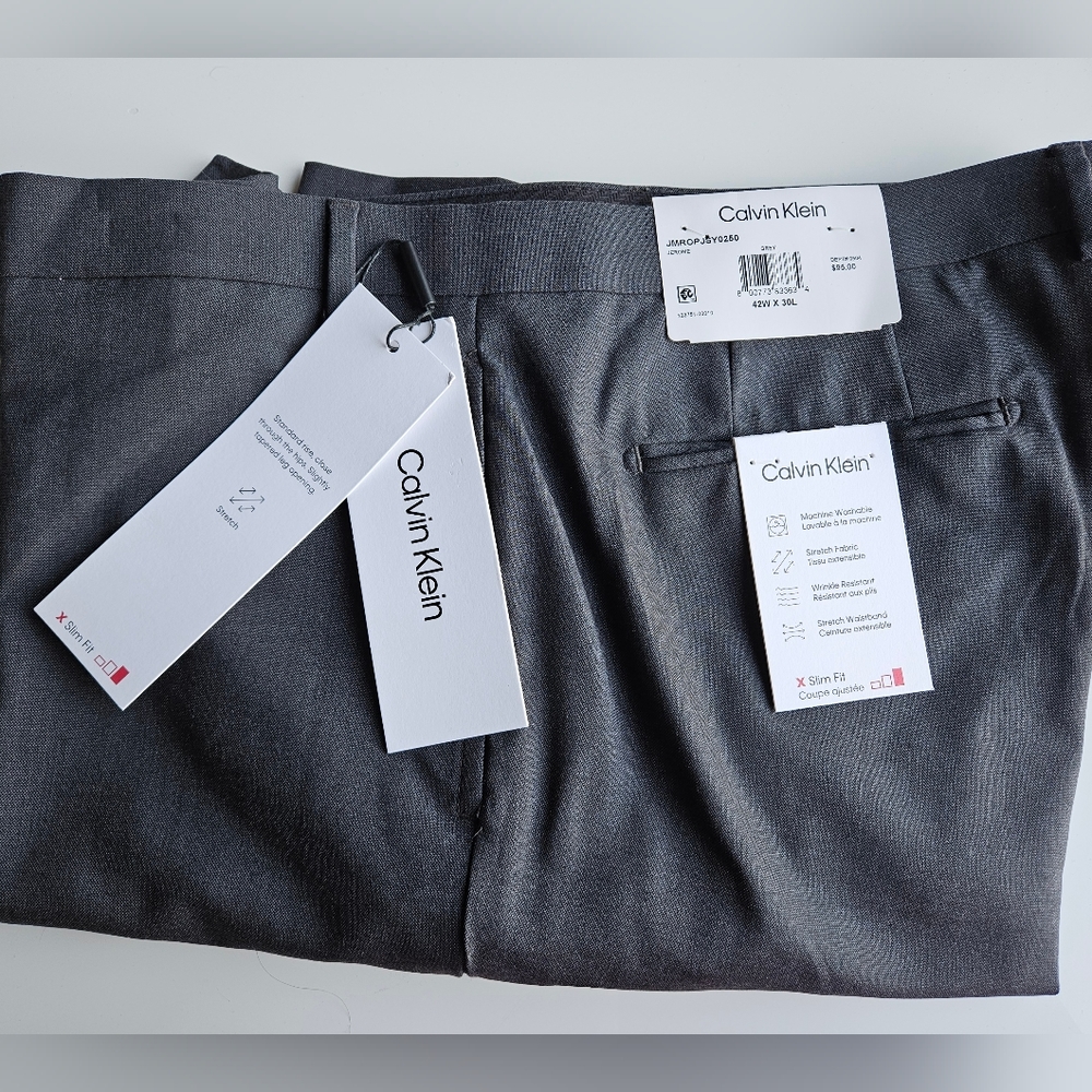 Calvin Klein Chinos, Brand NEW with tags.JEROME GREY